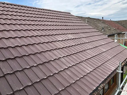 Brown tiled roof replacement on a bungalow A. Dawson Roofing Services Fife